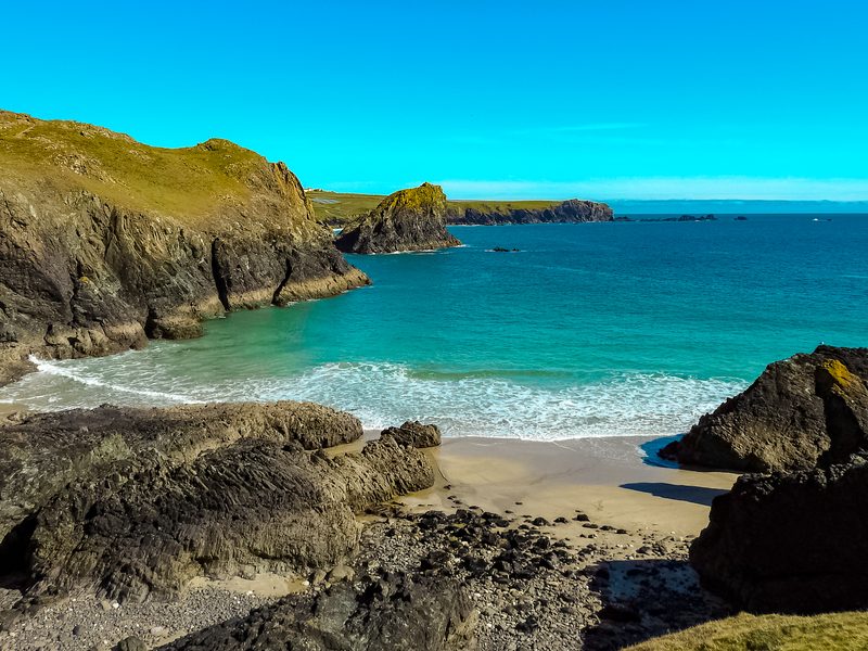 A turquoise cove and pale sand near the Lizard, south Cornwall
