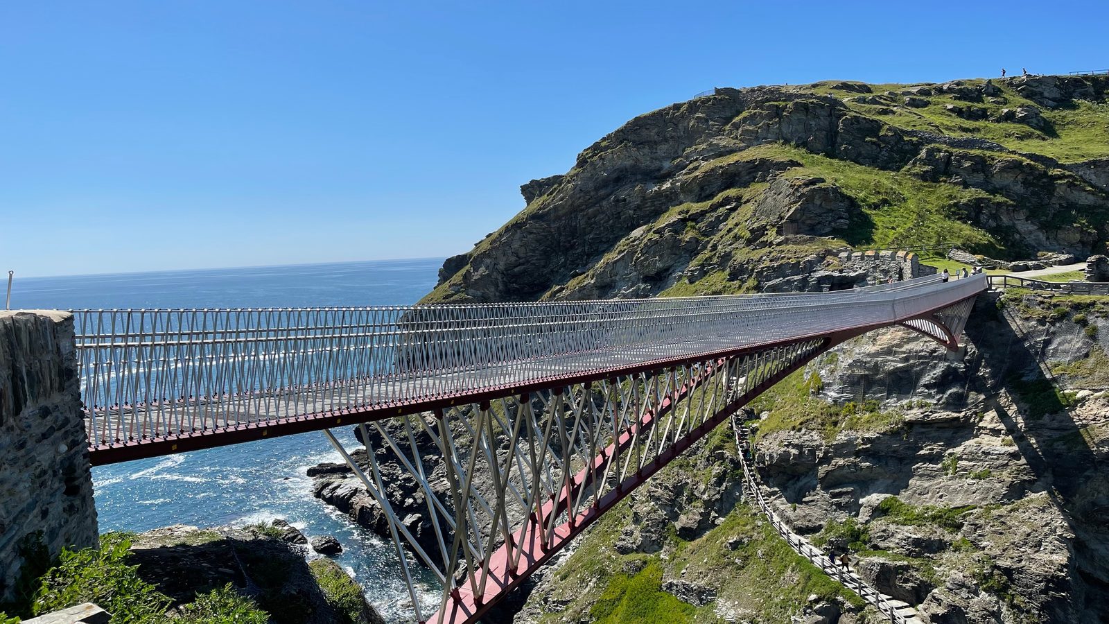 The footbridge to Tintagel Castle above the sea